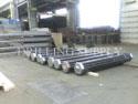 Drilling pipes are bundled together and ready for loading.